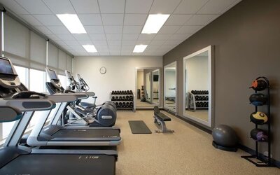 Gym at Embassy Suites By Hilton Orlando Airport.