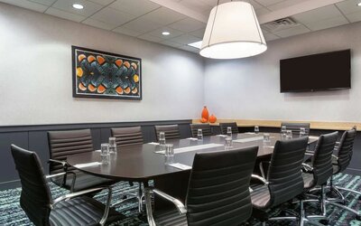 Meeting room at Embassy Suites By Hilton Orlando Airport.