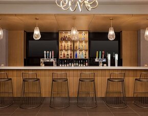 Hotel bar at DoubleTree By Hilton Pointe Claire Montreal Airport West.