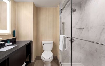 Guest bathroom at DoubleTree By Hilton Pointe Claire Montreal Airport West.