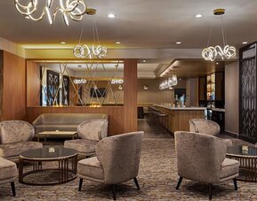 Lobby seating at DoubleTree By Hilton Pointe Claire Montreal Airport West.