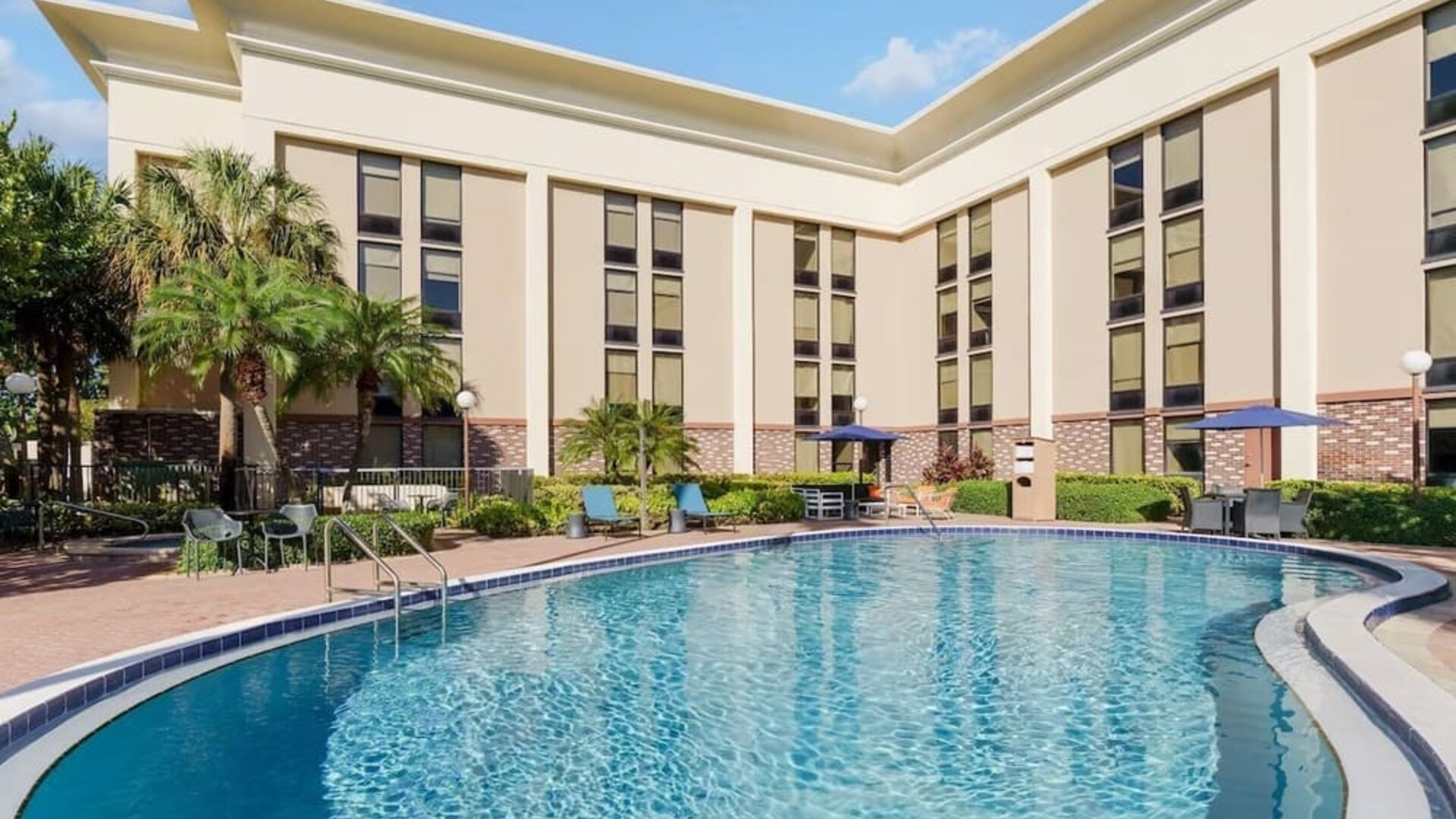 Outdoor pool at Hampton Inn By Hilton Fort Lauderdale-Cypress Creek.