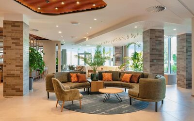 Lobby and lounge at Hilton Garden Inn Brussels Airport.