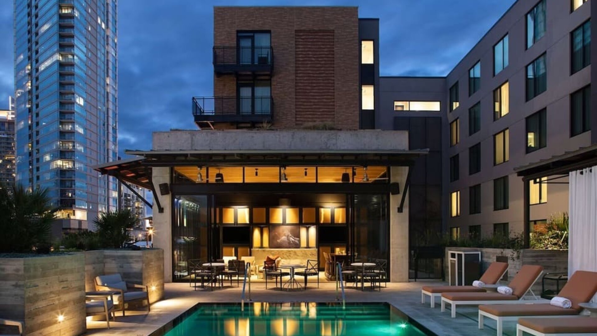 Pool and cabanas at Canopy By Hilton Austin Downtown.