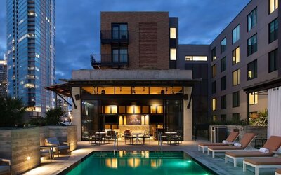 Pool and cabanas at Canopy By Hilton Austin Downtown.