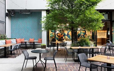 Outdoor dining at Canopy By Hilton Austin Downtown.