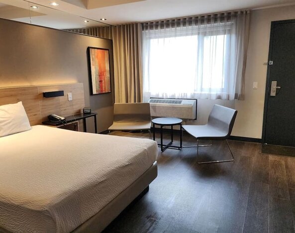 Day room at Ramada Laval By Wyndham.