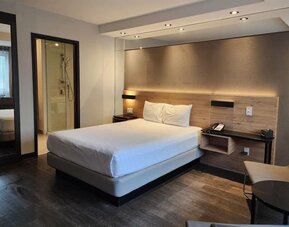 Day room at Ramada Laval By Wyndham.