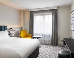 King room with TV at Leonardo Hotel Dublin Christchurch.