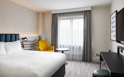 King room with TV at Leonardo Hotel Dublin Christchurch.