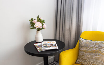 Chair and side table at Leonardo Hotel Dublin Christchurch.