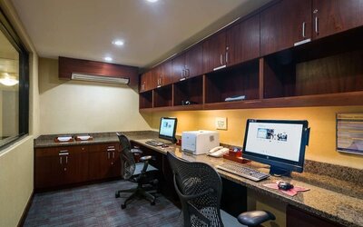 Fully equipped business center at Hilton Garden Inn Tribeca available for guest use.