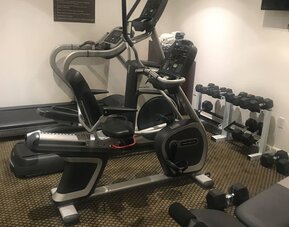 The Madison LES Hotel’s fitness center, with various exercise machinery/equipment.