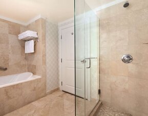 Modern bathroom at Hilton Los Angeles/San Gabriel with modern facilities and plush towels.