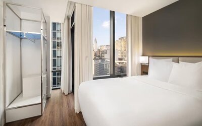 Comfortable day room with natural light at Best Western Premier Empire State Hotel.