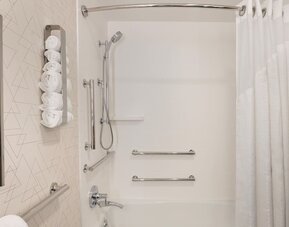 Guest bathroom with shower and tub at Holiday Inn Express New York City - Chelsea.