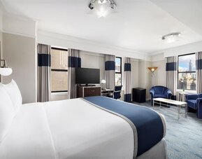 Day use room with work desk and natural light at New Yorker by Lotte Hotels.