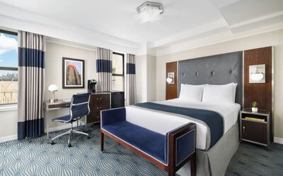 Day use room with work desk and natural light at New Yorker by Lotte Hotels.