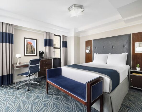 Day use room with work desk and natural light at New Yorker by Lotte Hotels.