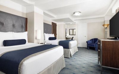 Day use room with work desk and natural light at New Yorker by Lotte Hotels.