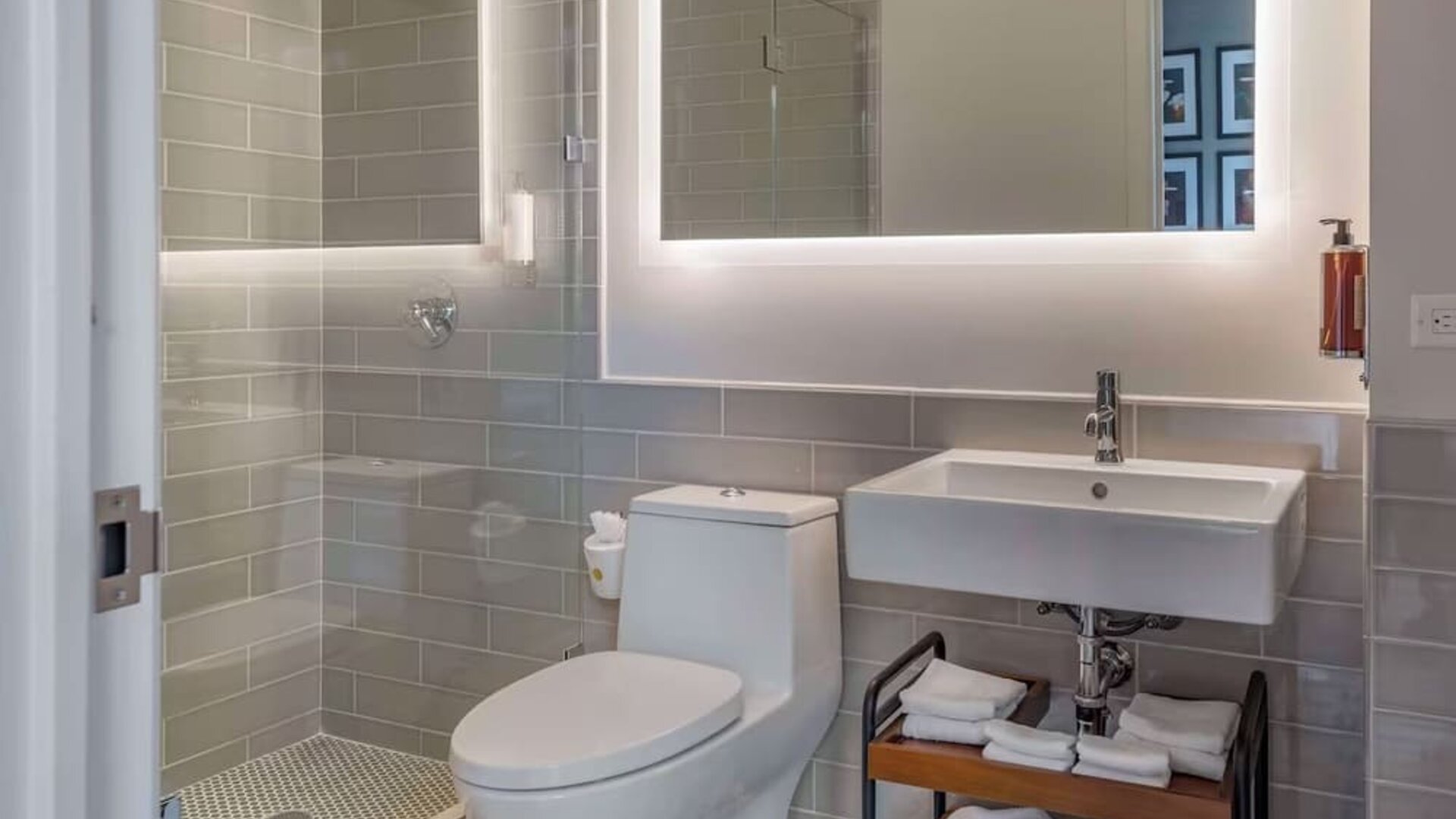 Modern bathroom with plush towels at The Draper Tapestry Collection By Hilton.