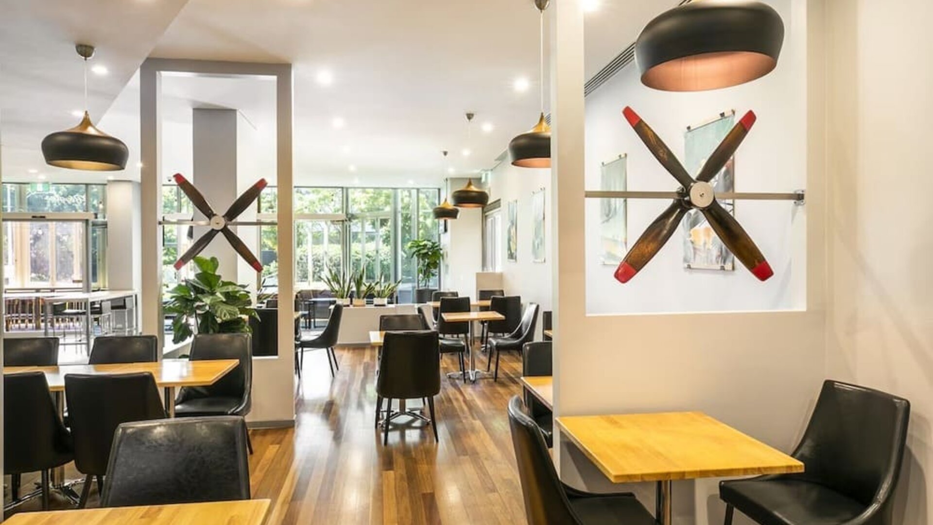 Dining area with natural light perfect for coworking at Crowne Plaza Sydney Airport.