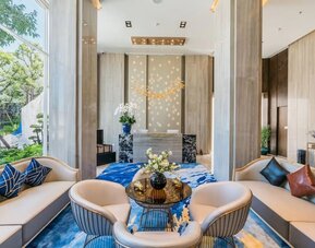 Business center with comfortable seating at Divalux Resort & Spa Bangkok Suvarnabhumi Airport.