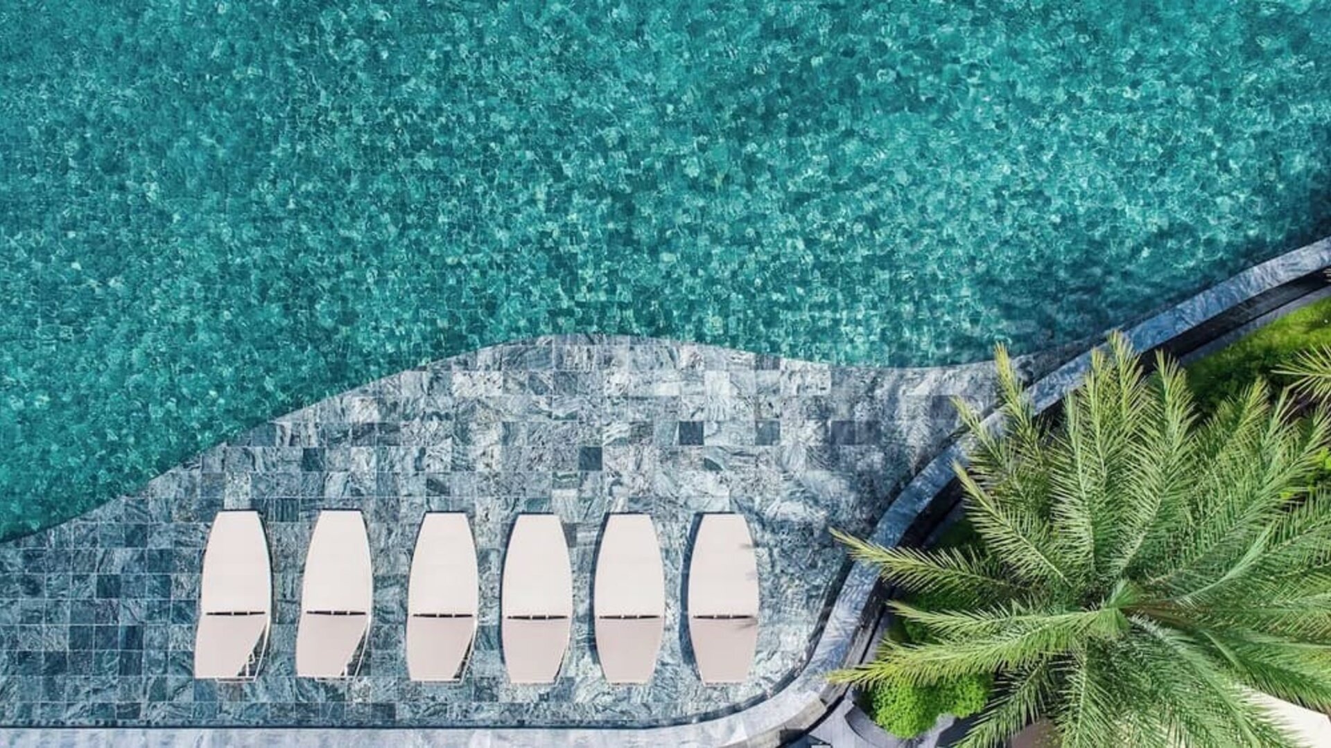 Large outdoor pool at Divalux Resort & Spa Bangkok Suvarnabhumi Airport.