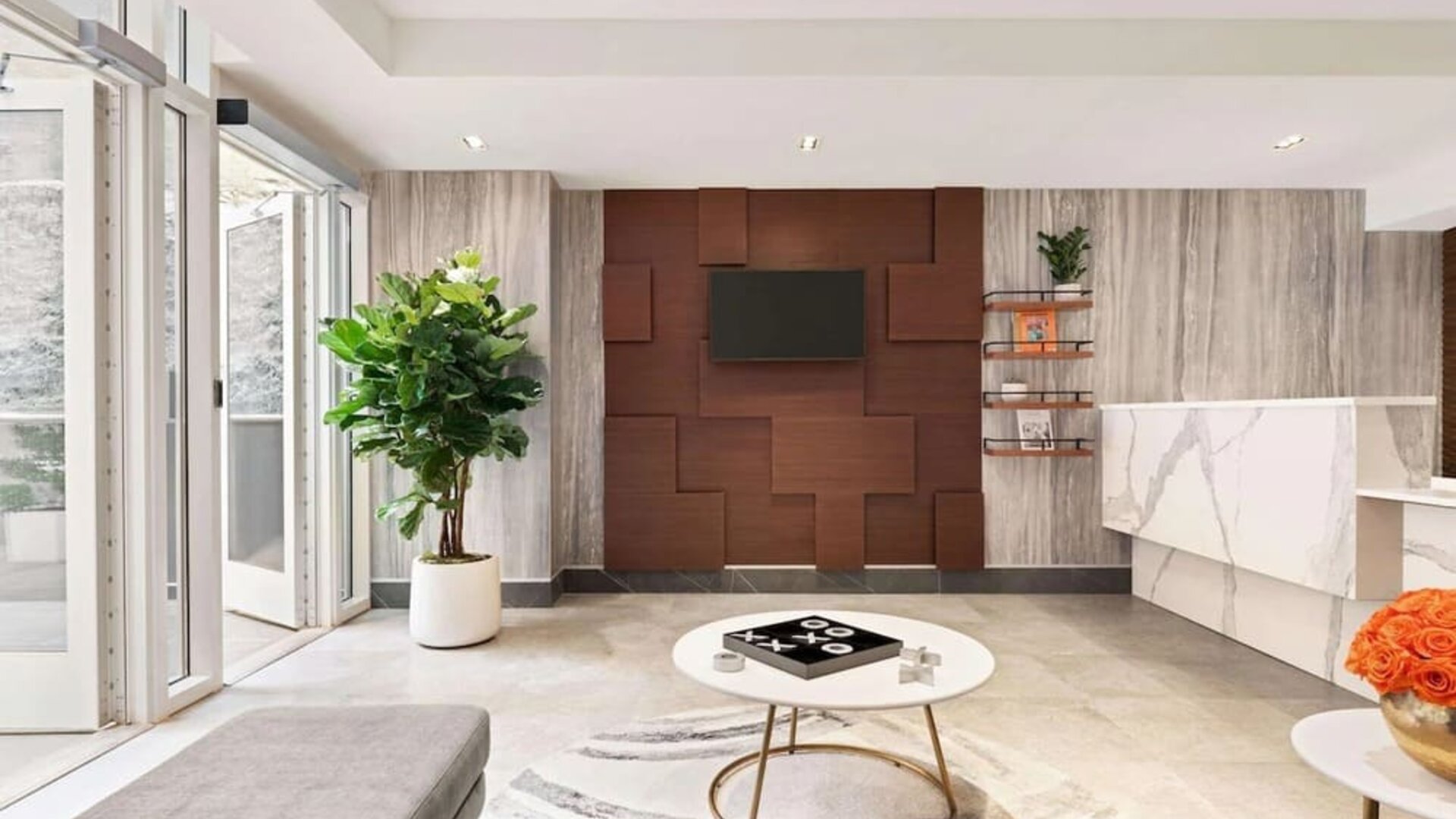 Lobby area with comfortable seating at Wingate By Wyndham New York Midtown South/5th Ave.