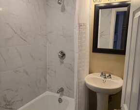 Bathroom at Nashoba Valley Inn & Suit.