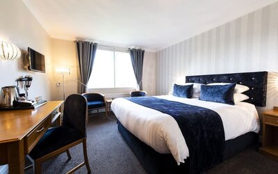 Day room with workspace at The Old Golf House Hotel.