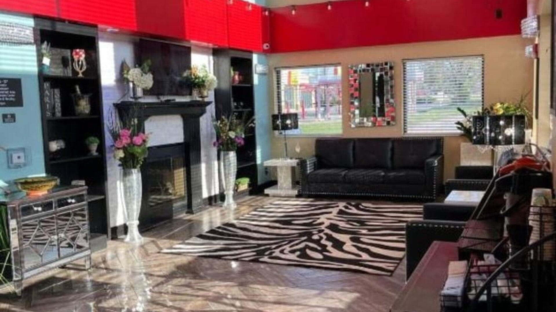 Lobby with comfortable seating at Coratel Inn And Suites By Jasper Wichita North.