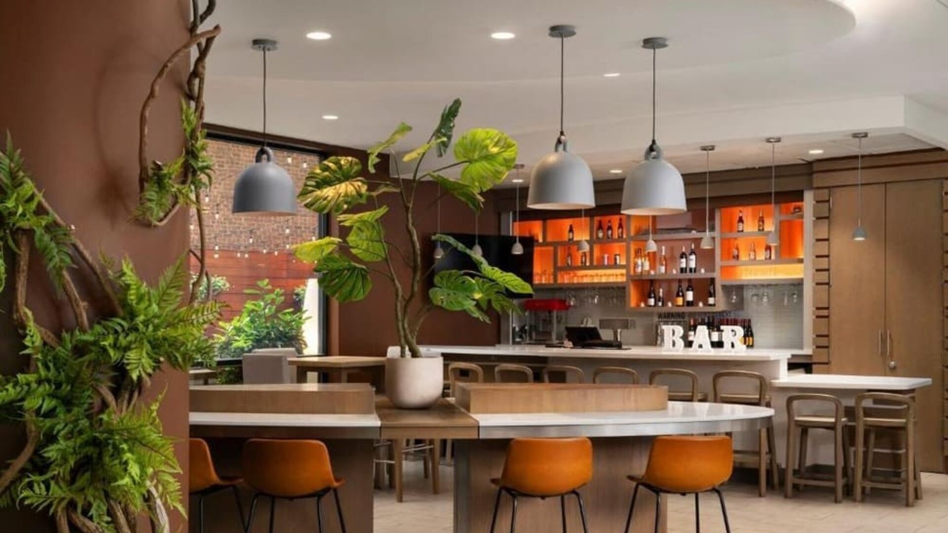 Stylish bar at EVEN Hotel Brooklyn By IHG, ideal for unwinding after a busy day.