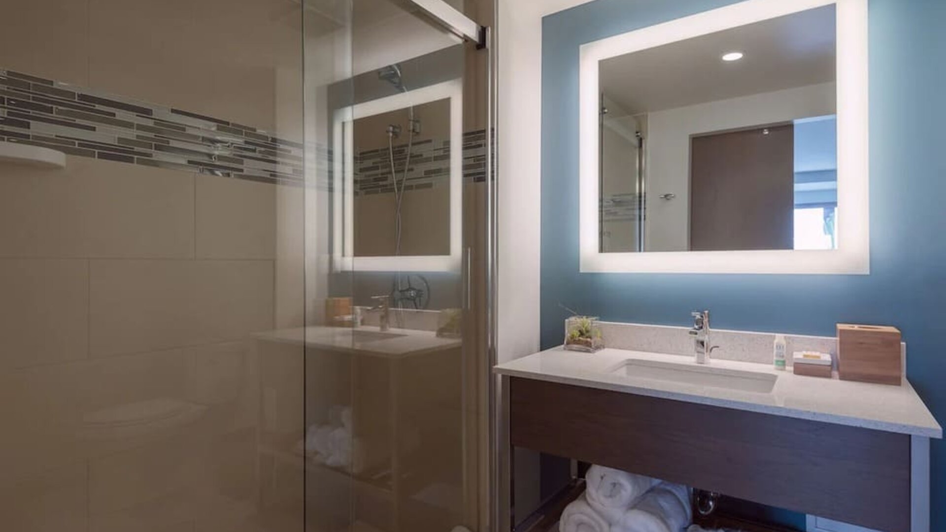 Modern bathroom with plush towels at EVEN Hotel Brooklyn By IHG.