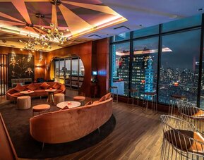 Rooftop bar overlooking the city at Aliz Hotel Times Square.
