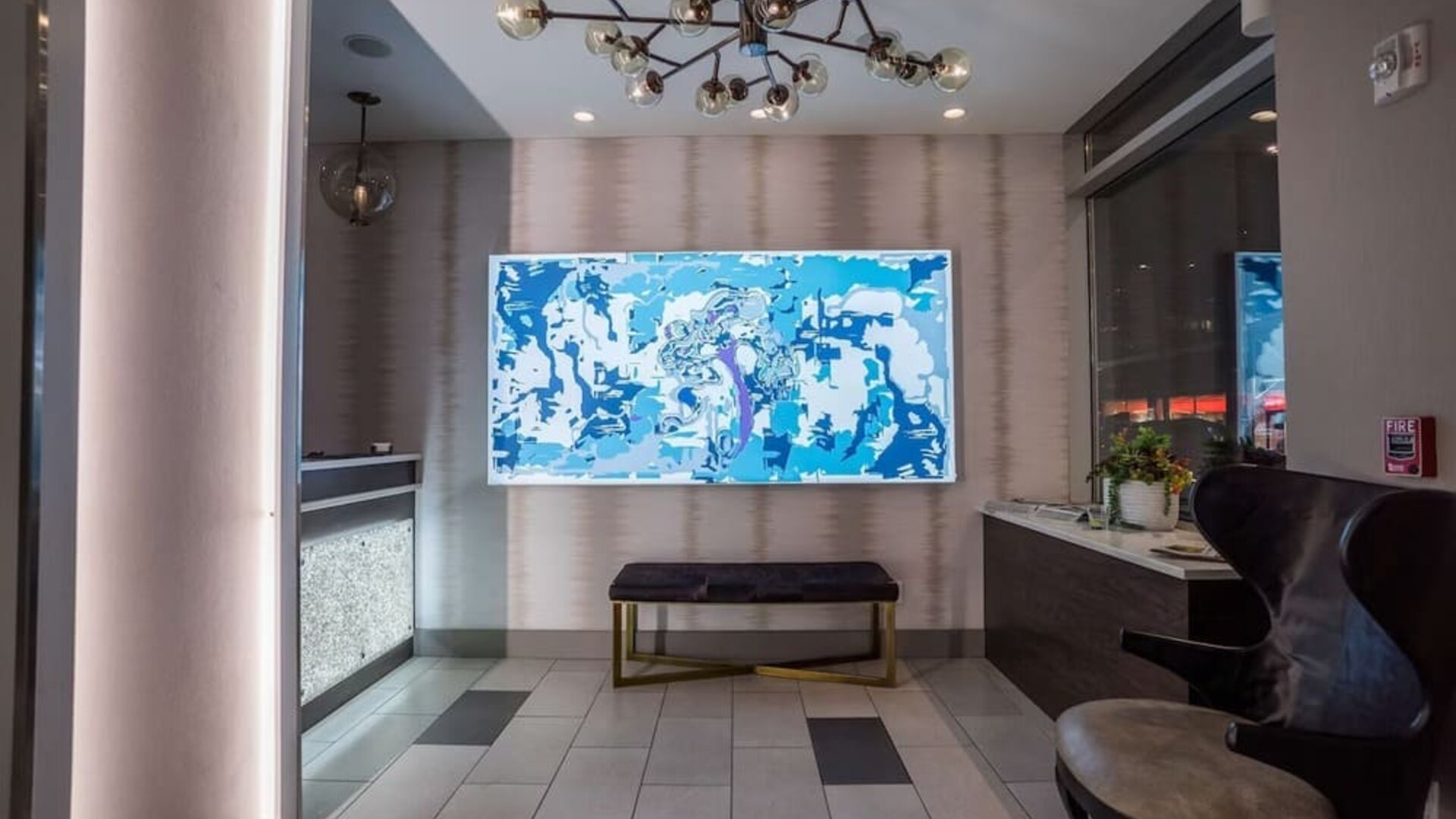 Welcoming reception with seating at The Bernic Hotel New York City, Tapestry Collection By Hilton.