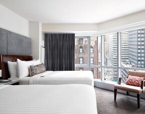 Day use room with large windows and natural light at Hotel 48LEX New York.