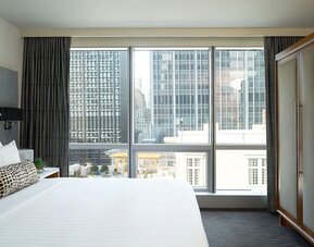 Day use room with large windows and natural light at Hotel 48LEX New York.