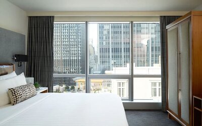 Day use room with large windows and natural light at Hotel 48LEX New York.