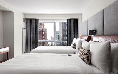 Day use room with large windows and natural light at Hotel 48LEX New York.