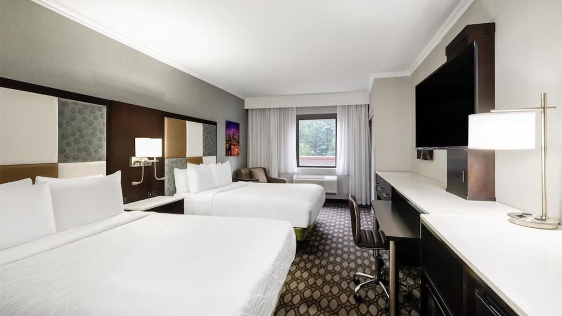 Day use room with work desk at Best Western Premier NYC Gateway.