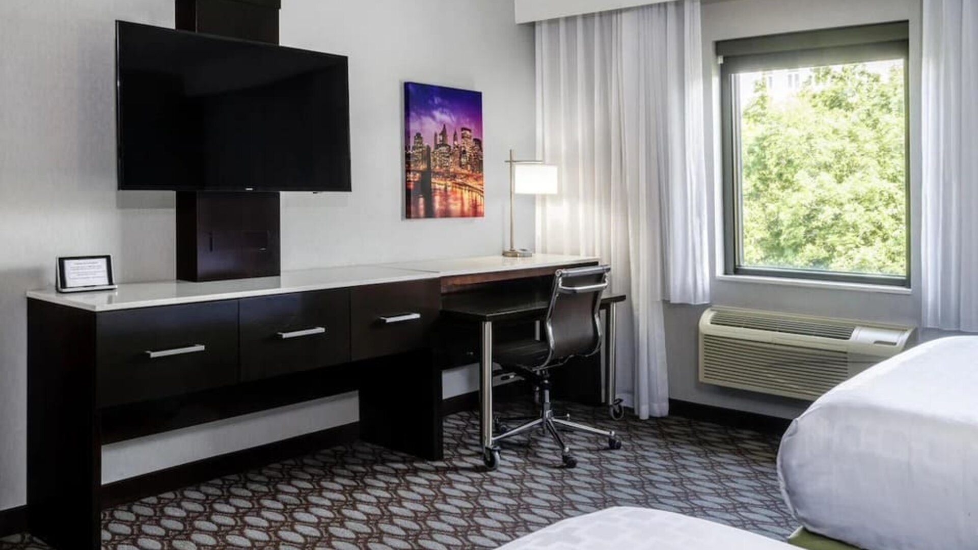 Day use room with work desk at Best Western Premier NYC Gateway.