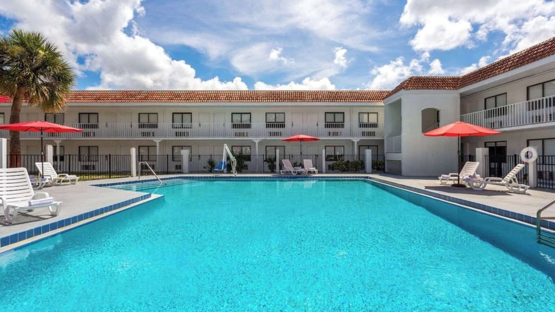 Beautiful outdoor pool at Travelodge by Wyndham Fundamental.