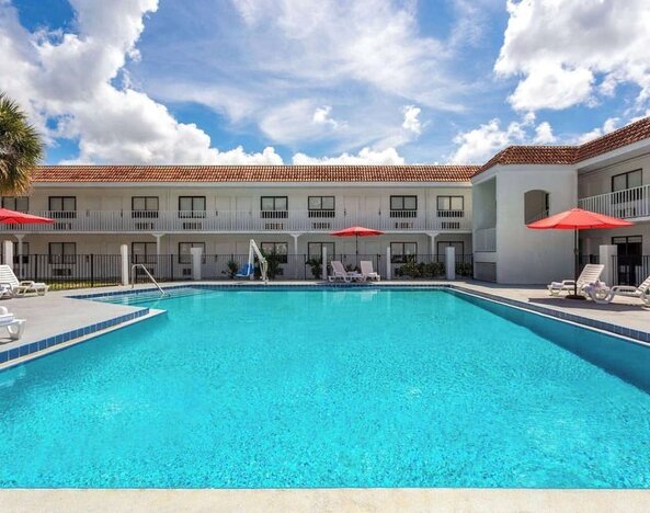 Beautiful outdoor pool at Travelodge by Wyndham Fundamental.