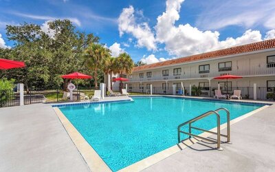 Relaxing outdoor pool at Travelodge by Wyndham Fundamental.