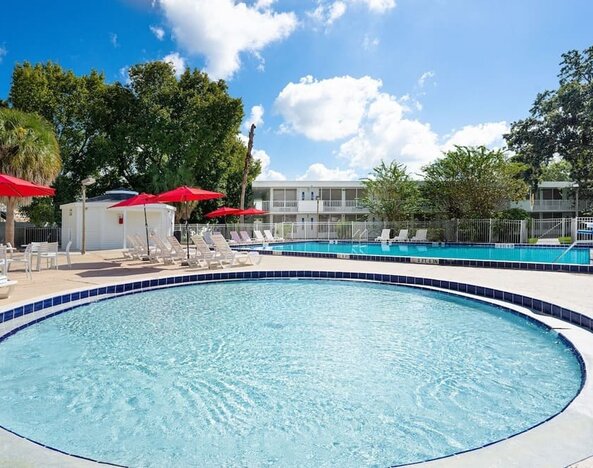 Relaxing outdoor pool at Baymont by Wyndham Maingate.