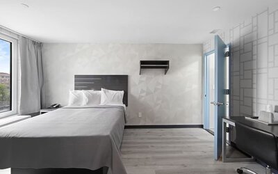 Day use room with work desk at Hotel 365 Bronx.