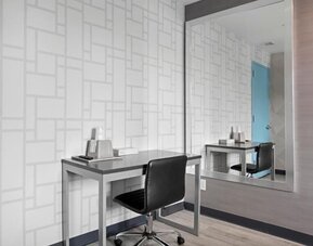 Day use room with work desk at Hotel 365 Bronx.