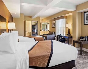 Day use room with sofa and work desk at Best Western Plus Newark Airport West.