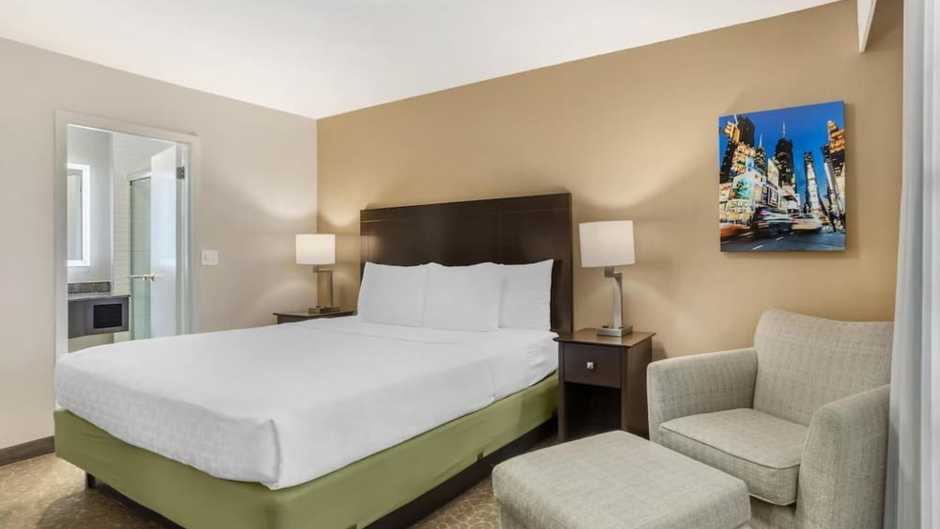 Day room with ensuite and a couch at Best Western Fort Lee.